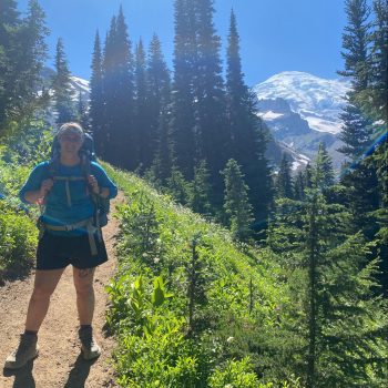 Outdoors Grant Writer Sarah Mitchell hiking the Wonderland Trail in Washington state
